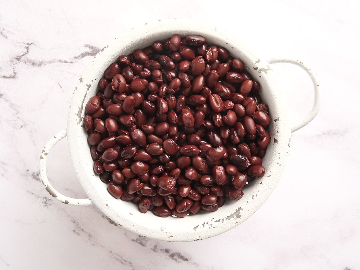 Drained and rinsed black beans in a bowl.