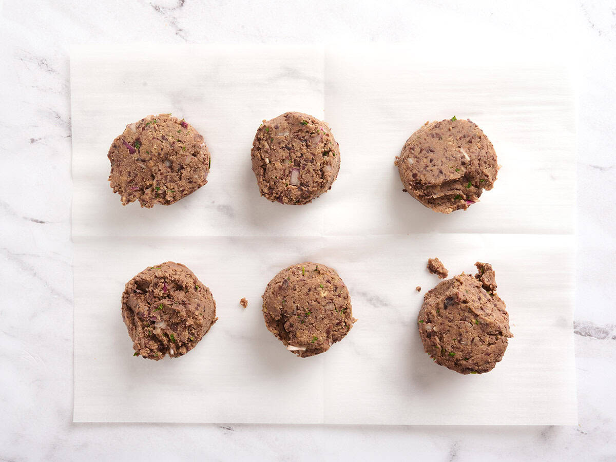 Black bean burger mix divided into six balls.