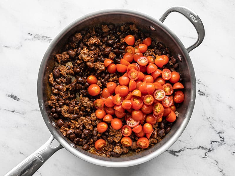 tomatoes added to the skillet