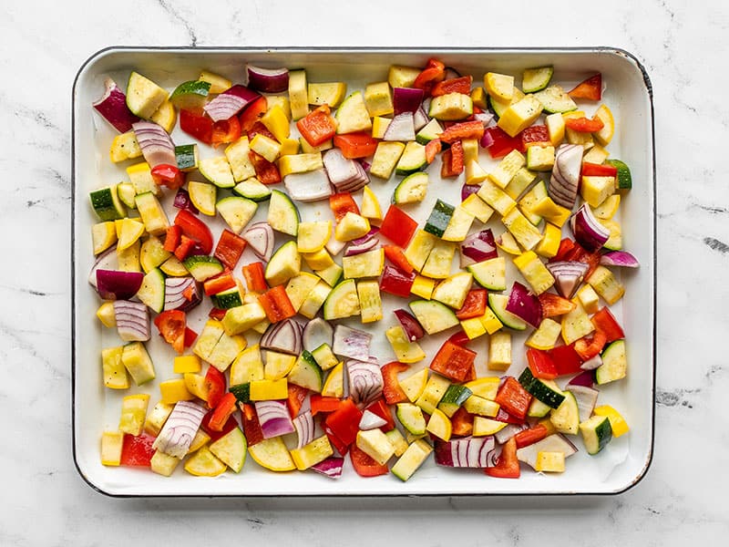 Diced vegetables on a baking sheet