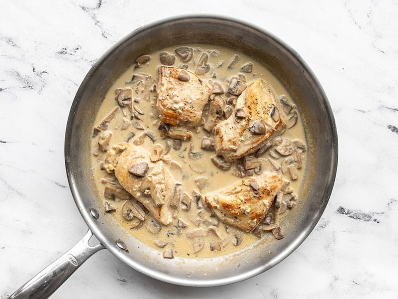 Chicken in creamy mushroom sauce in the skillet