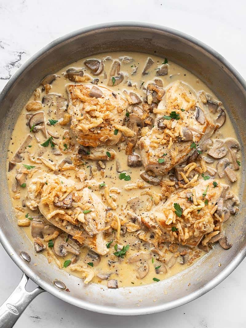 Overhead view of creamy mushroom chicken in the skillet