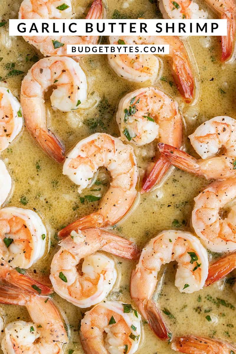 Close up of garlic butter shrimp with title text at the top