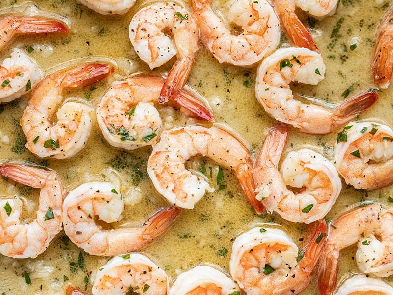 Close up of Garlic Butter Shrimp in pan sauce