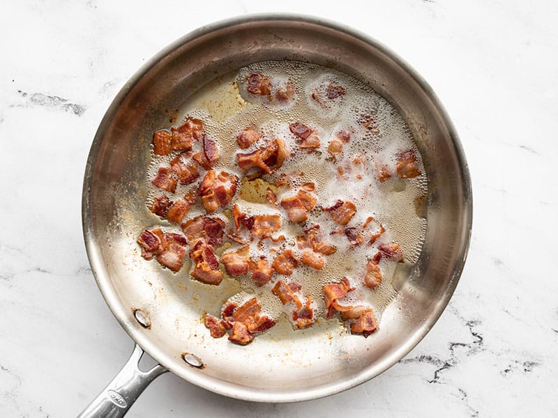 Bacon cooking in a skillet