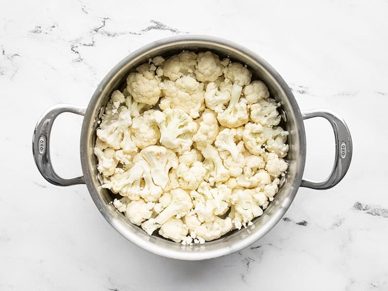 cauliflower florets in a pot with water