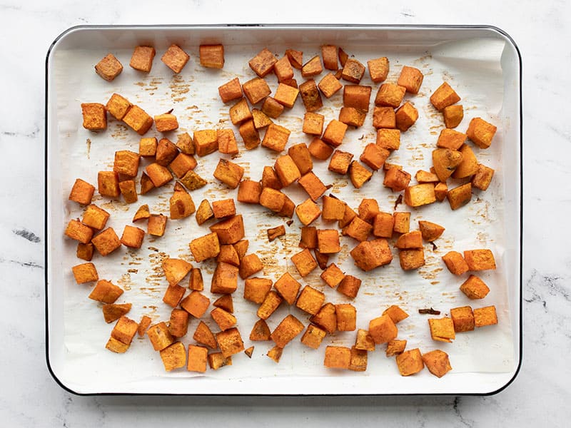 Roasted sweet potatoes on the baking sheet