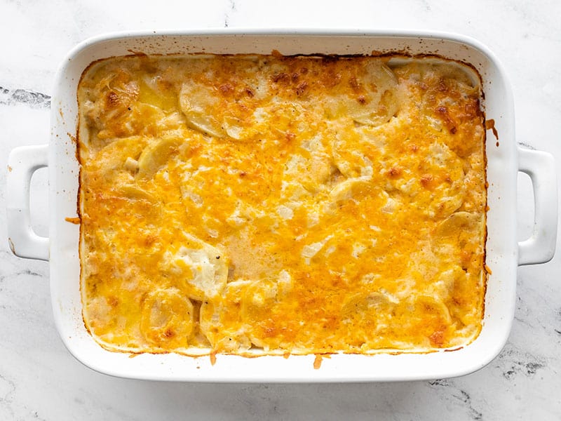 Baked potatoes au gratin in the casserole dish