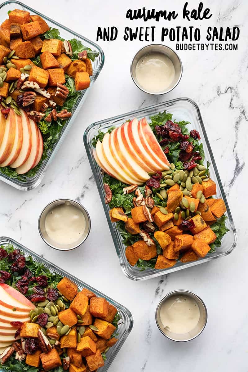 autumn kale and sweet potato salad in glass meal prep containers
