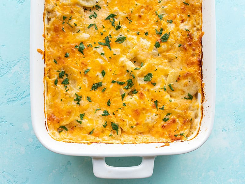 Overhead view of casserole dish full of potatoes au gratin