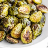 Close up side view of Roasted Brussels Sprouts in a bowl