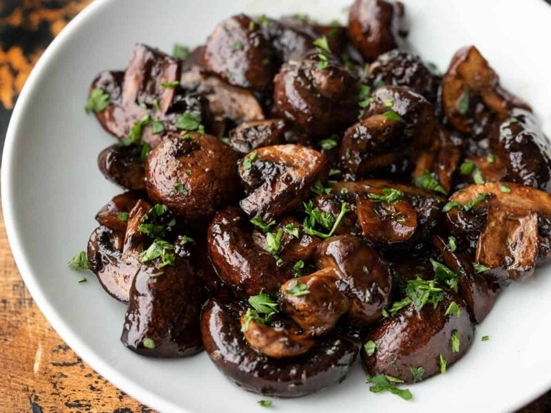 Side view of balsamic roasted vegetables in a bowl