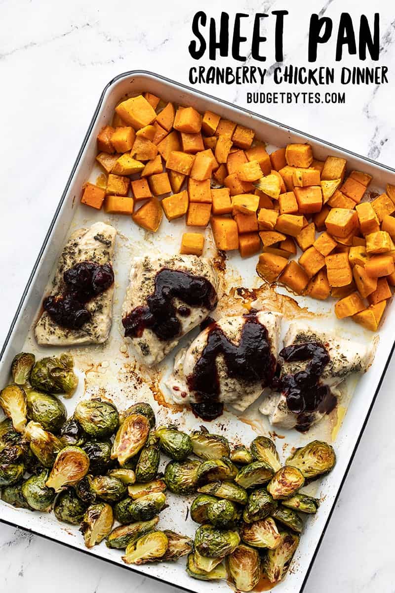 Sheet Pan Cranberry Chicken Dinner on the sheet pan, title text at the top