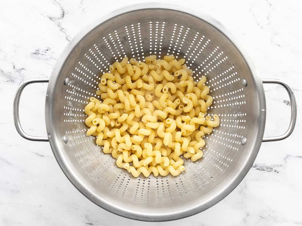 Cooked cavatappi pasta in a colander