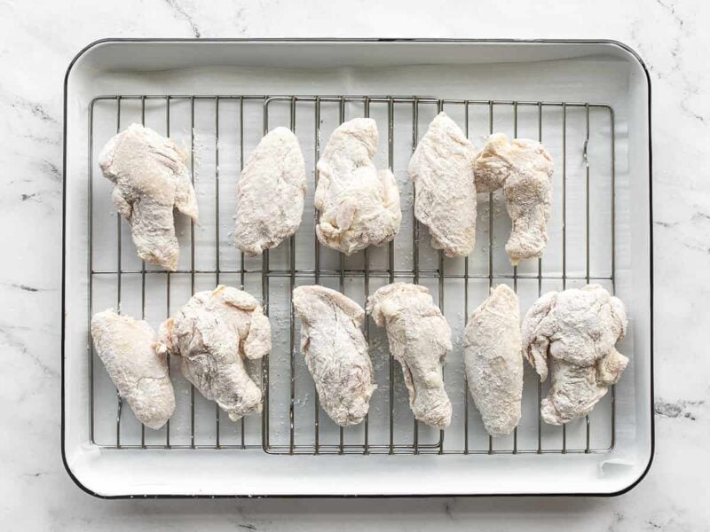 Chicken wings on the baking sheet ready to bake
