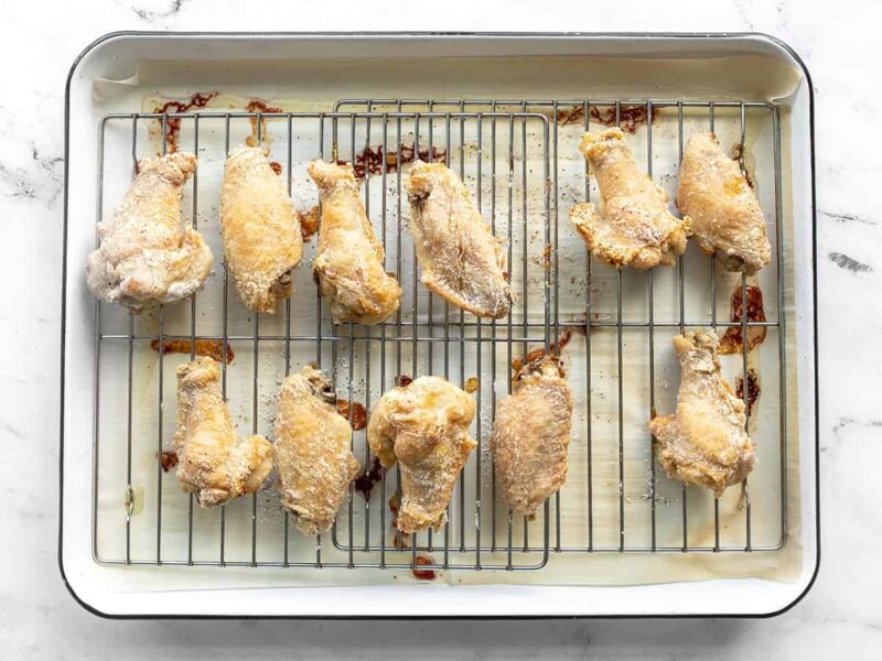Baked chicken wings on the baking sheet