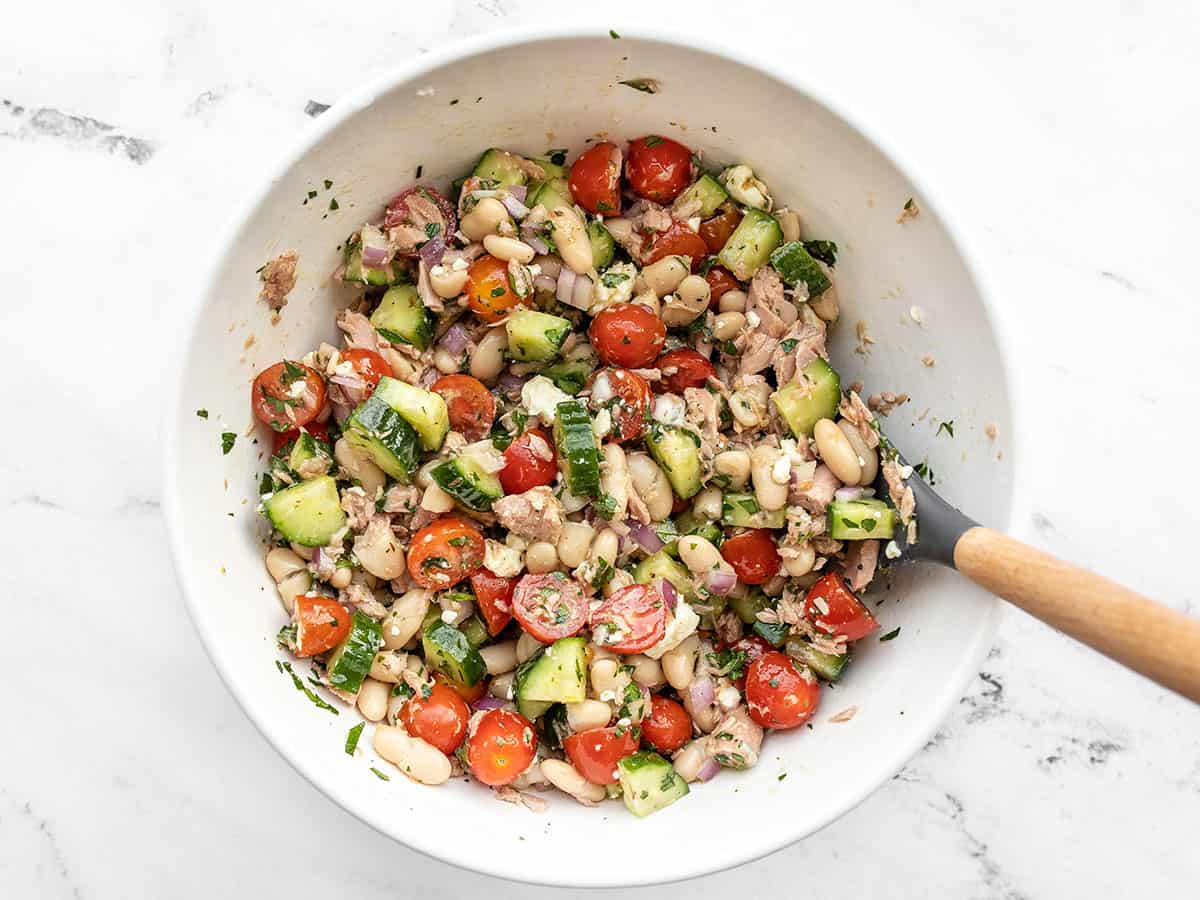 Finished Mediterranean Tuna Salad in the bowl with a spatula