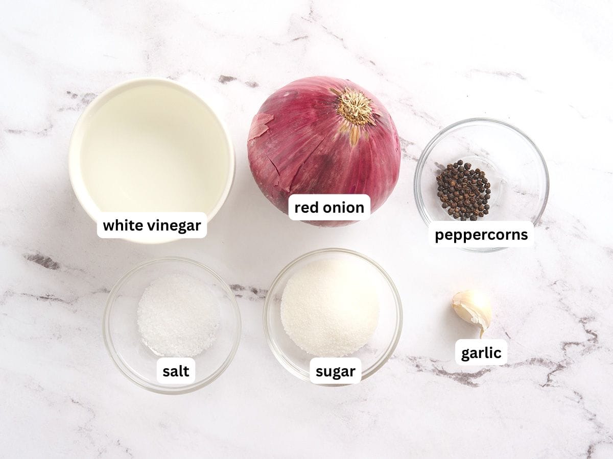 The ingredients to make homemade pickled red onions.
