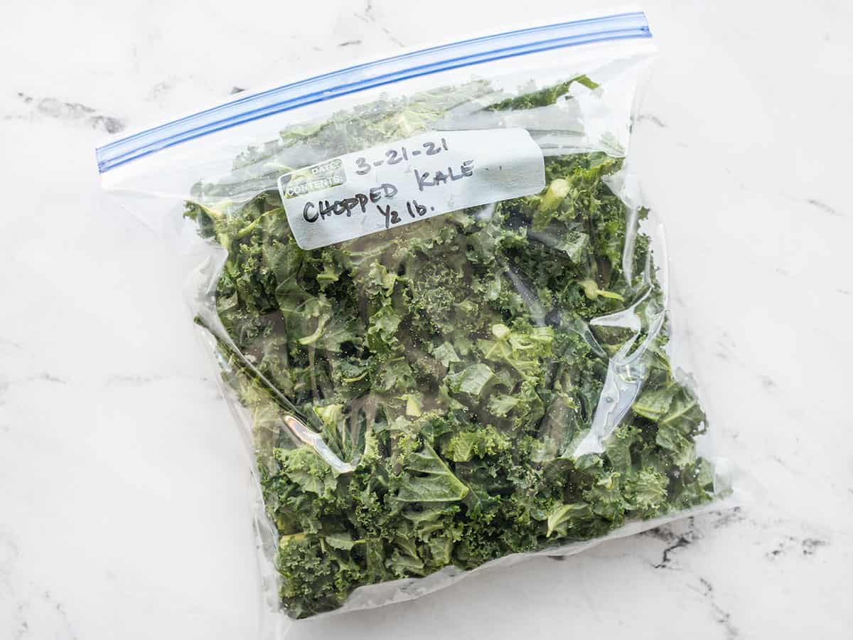 kale in a freezer bag that is labeled and dated
