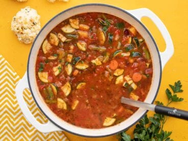 Overhead view of a pot full of vegetarian minestrone