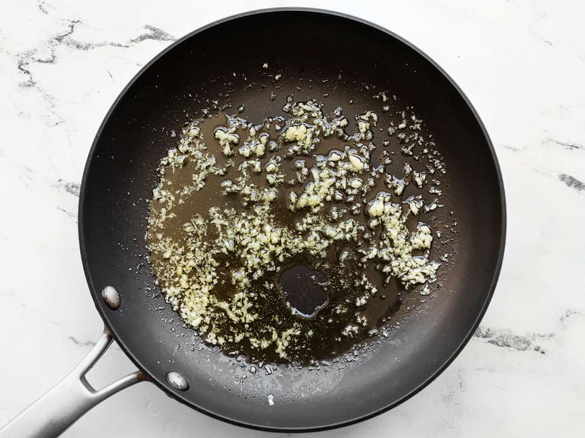 Minced garlic in oil in a skillet