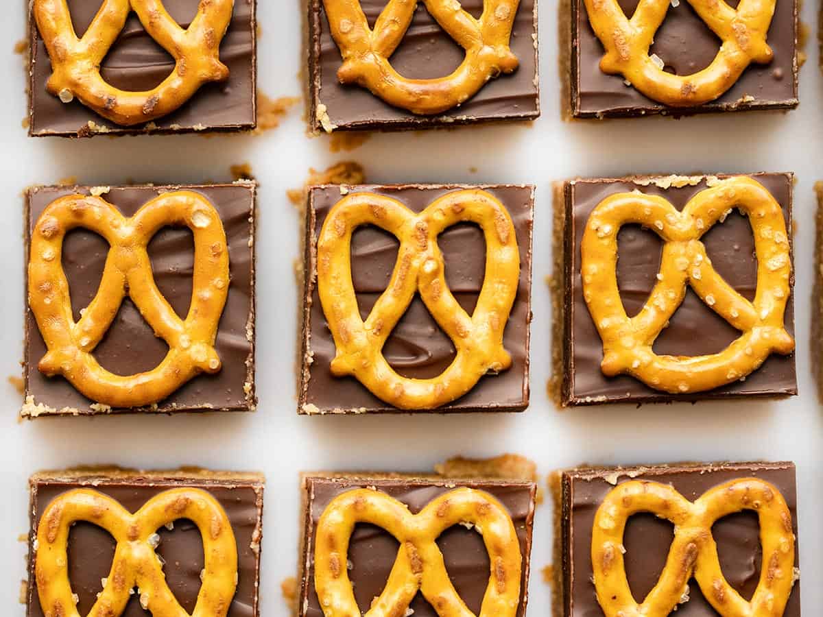 overhead view of no bake pretzel peanut butter bars lined up in a grid