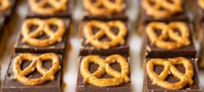 front view of no bake pretzel peanut butter bars lined up in a grid
