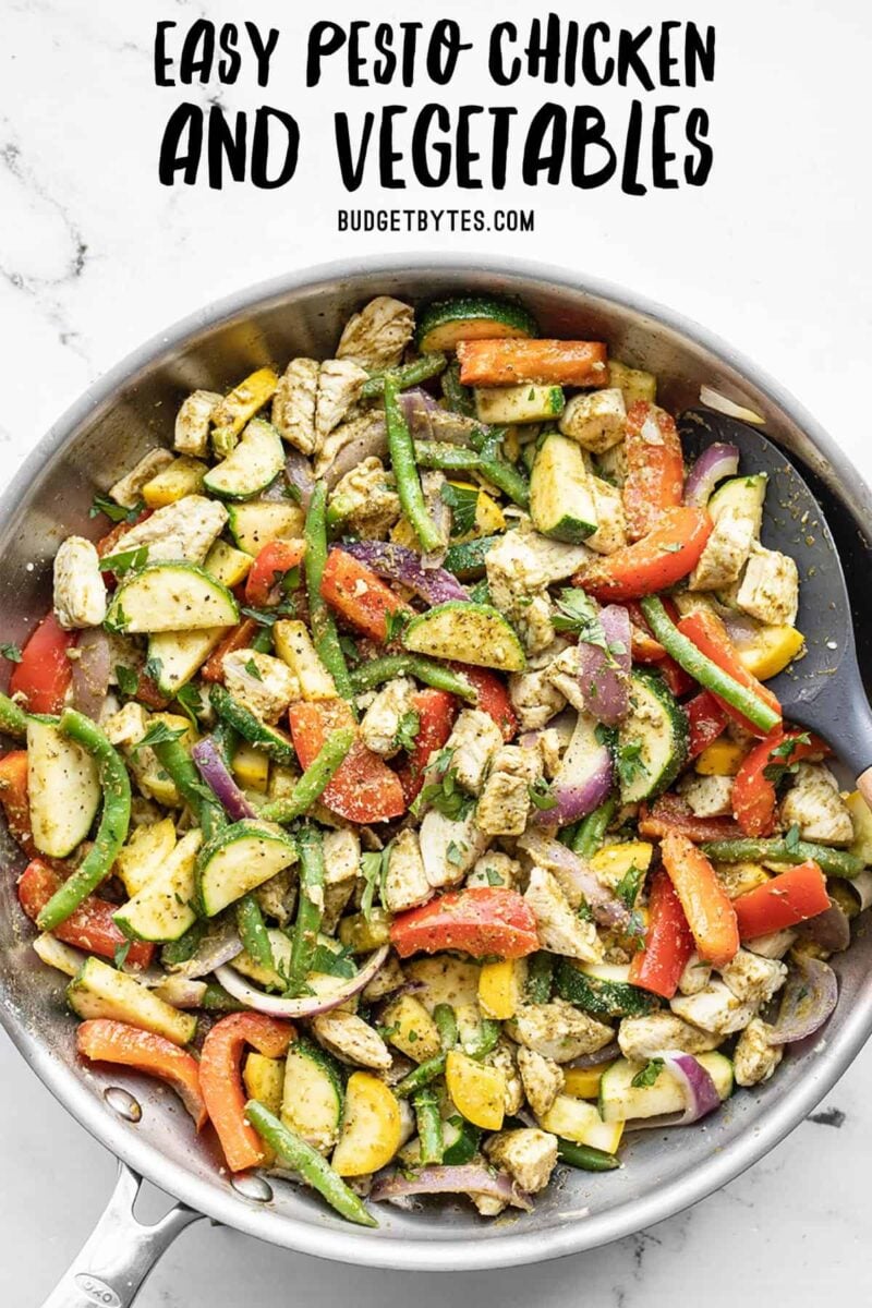 pesto chicken and vegetables in a skillet, title text at the top