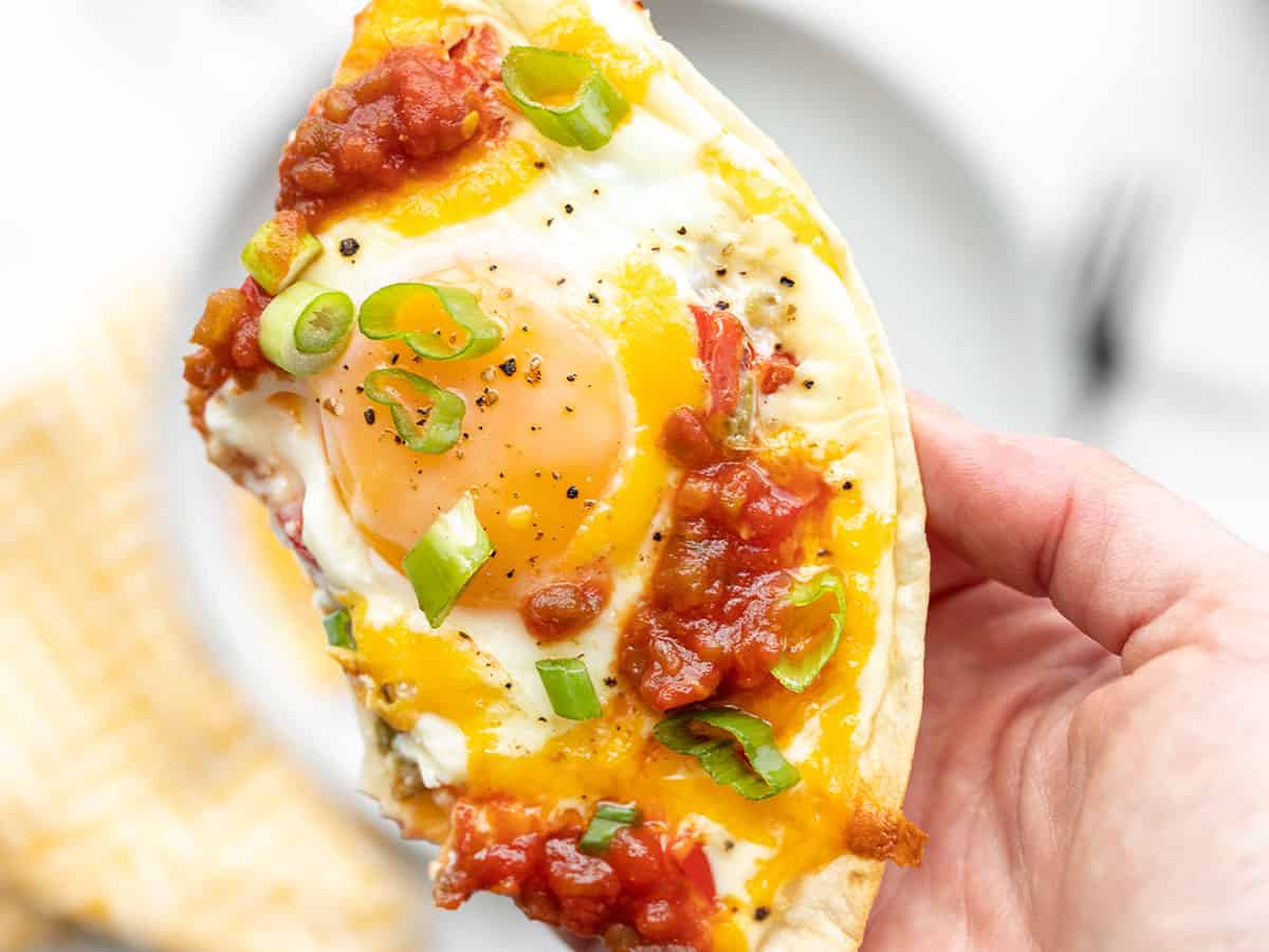 Close up of a slice of southwest tortilla baked eggs