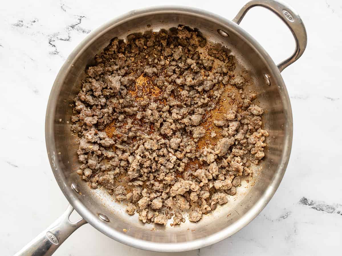 browned sausage in a skillet