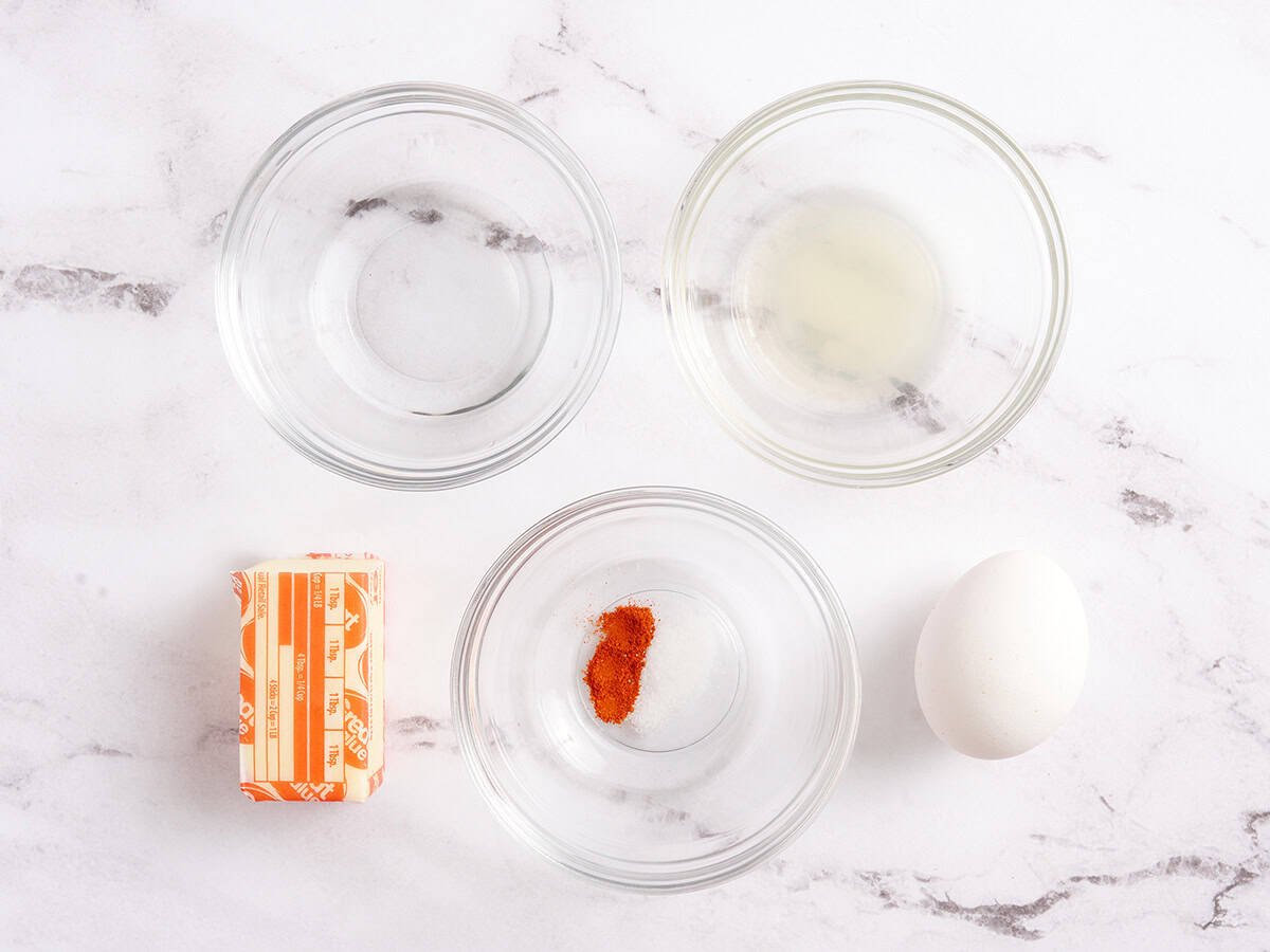 The ingredients to make a homemade hollandaise sauce.