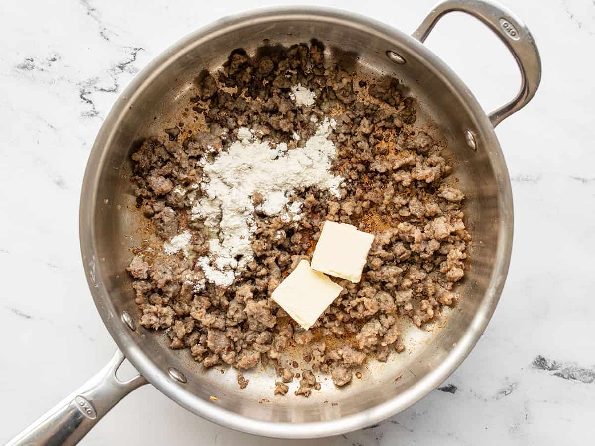 butter and flour added to cooked sausage in a skillet