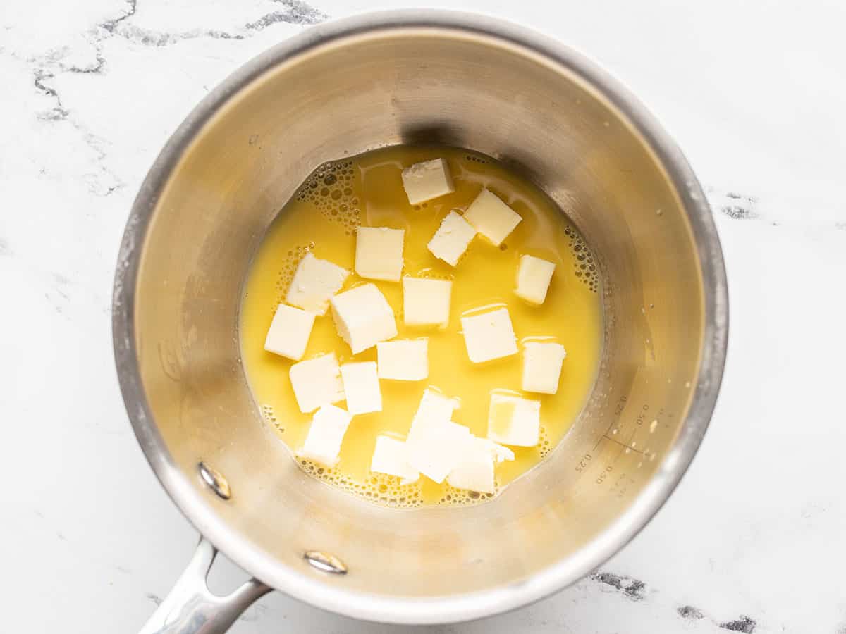 small butter cubes added to the saucepot