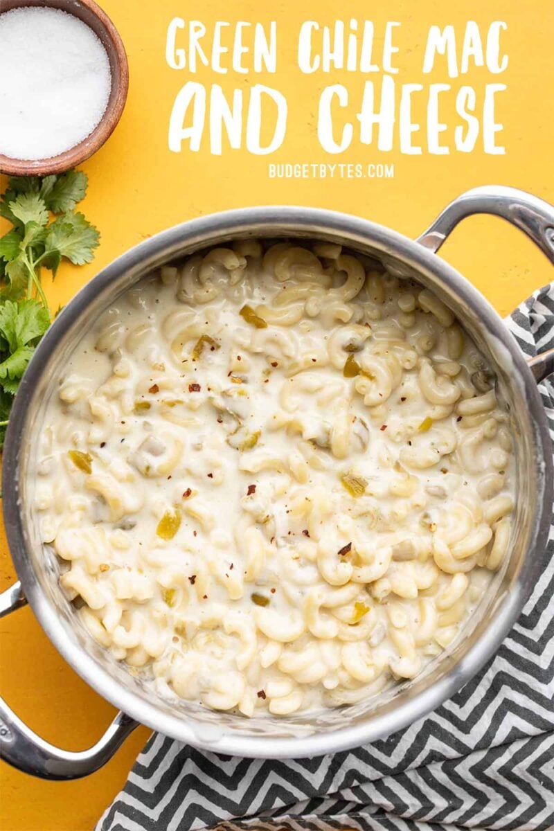 A pot full of green chile mac and cheese, title text at the top