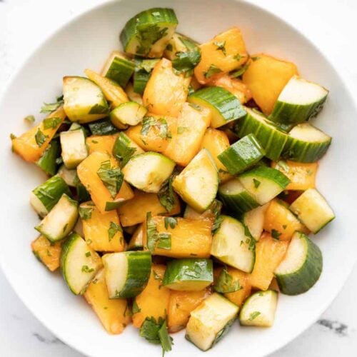 Overhead view of Spicy Pineapple Cucumber Salad in a bowl