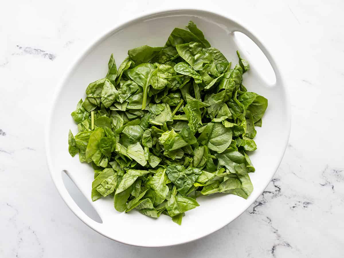 Chopped spinach in a serving bowl