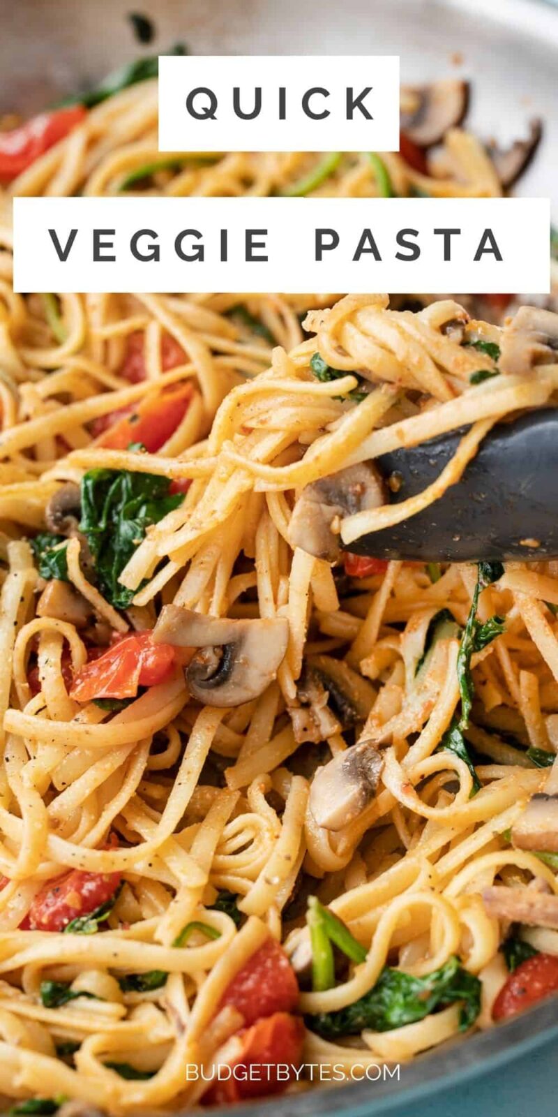 close up of veggie pasta being picked up by tongs, title text at the top