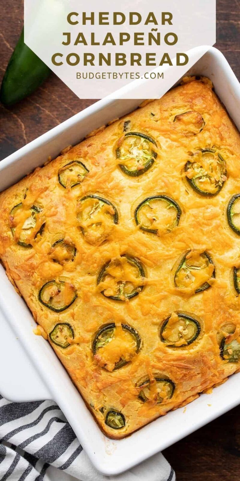 Overhead view of jalapeño cornbread in the baking dish, title text at the top