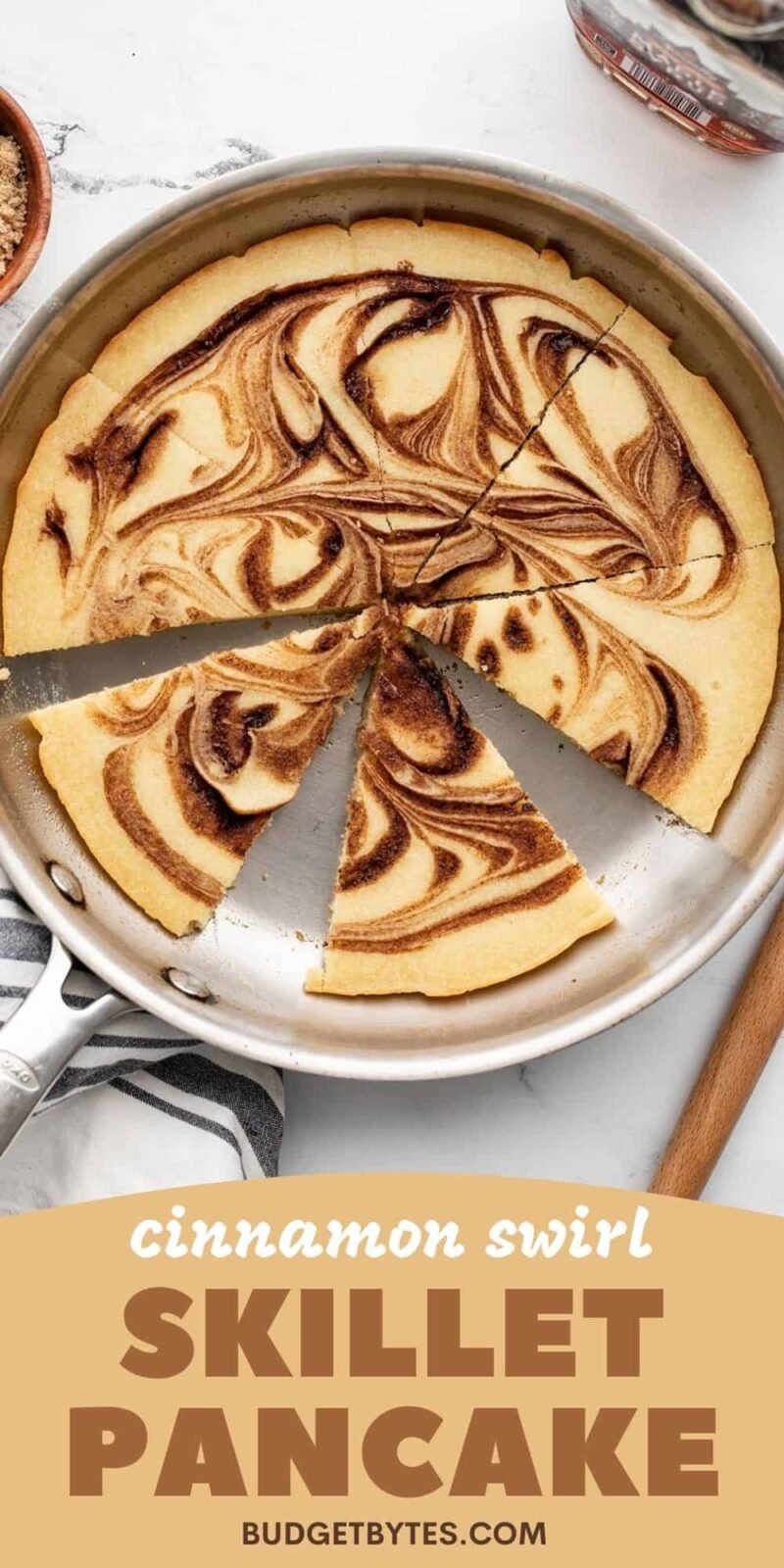 Overhead view of a sliced oven pancake in the skillet, title text at the bottom