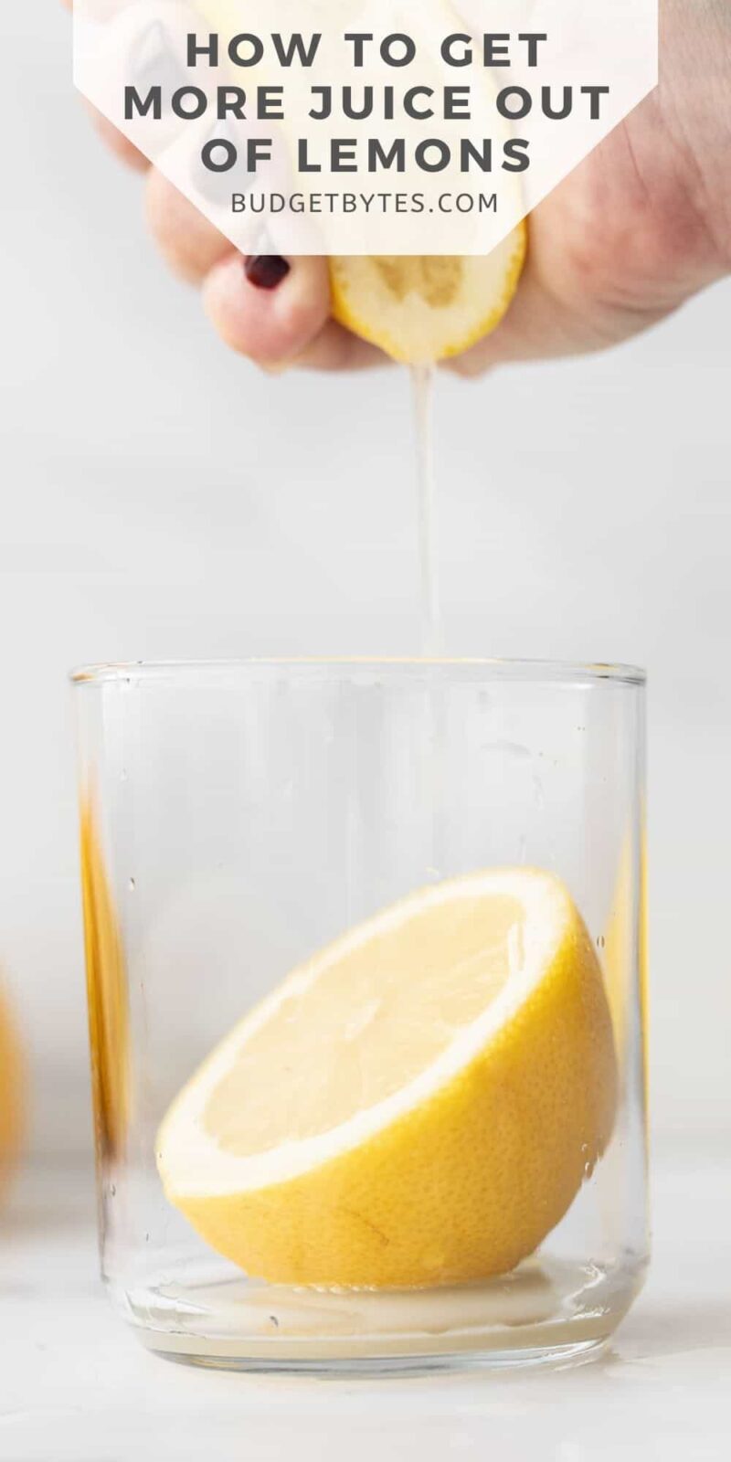 a hand squeezing a lemon into a glass, title text at the top