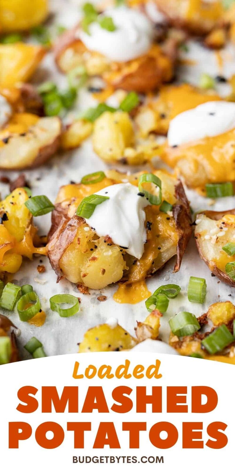 side view of loaded smashed potatoes on a baking sheet, title text at the bottom