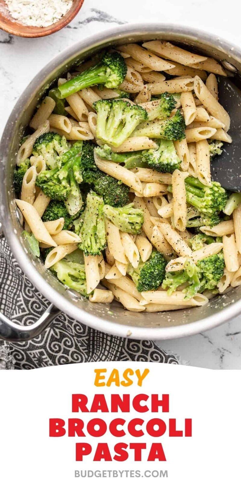 Overhead view of ranch broccoli pasta in the pot, title text at the bottom