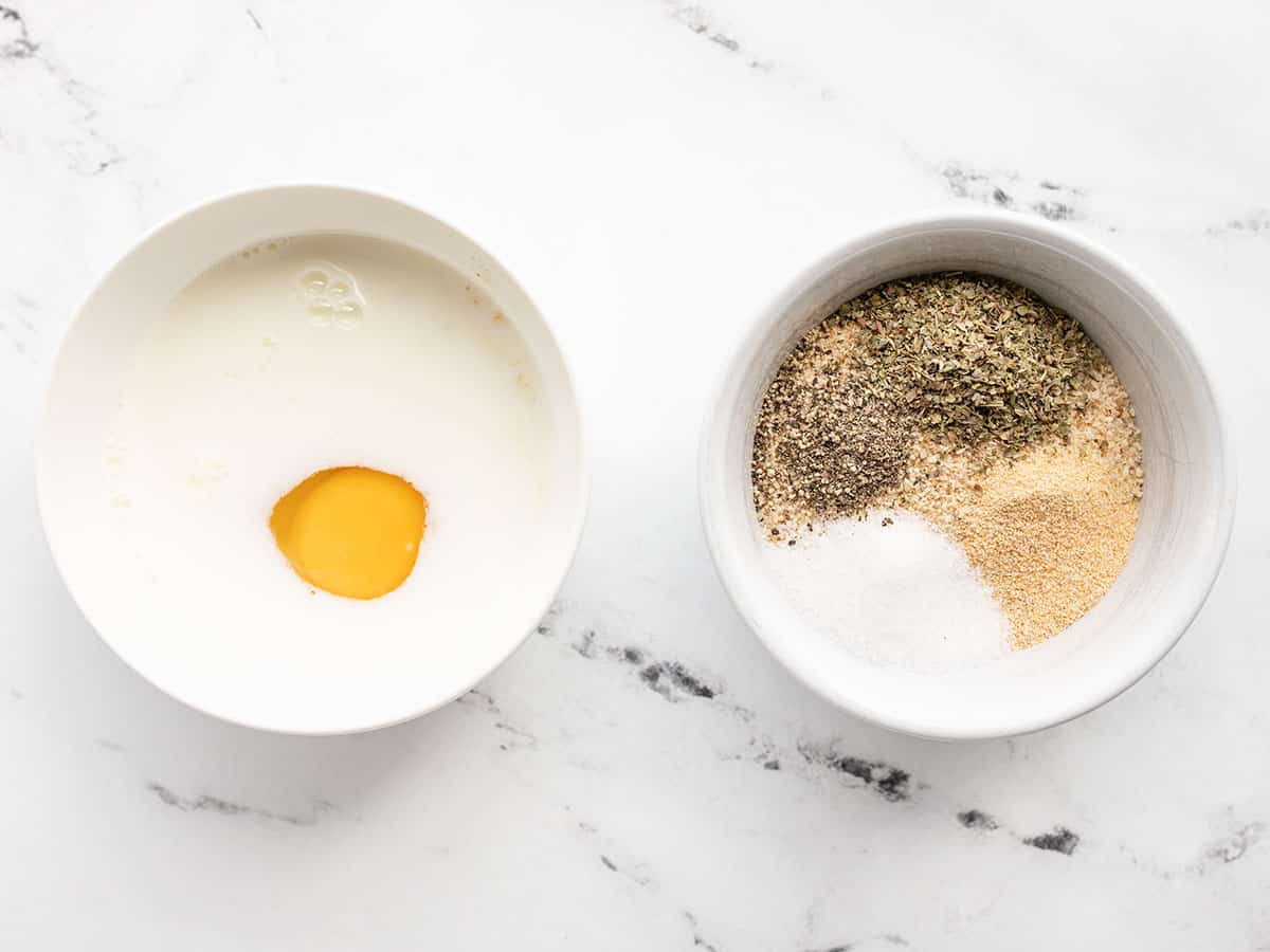 Wet and dry ingredients for meatloaf in separate bowls