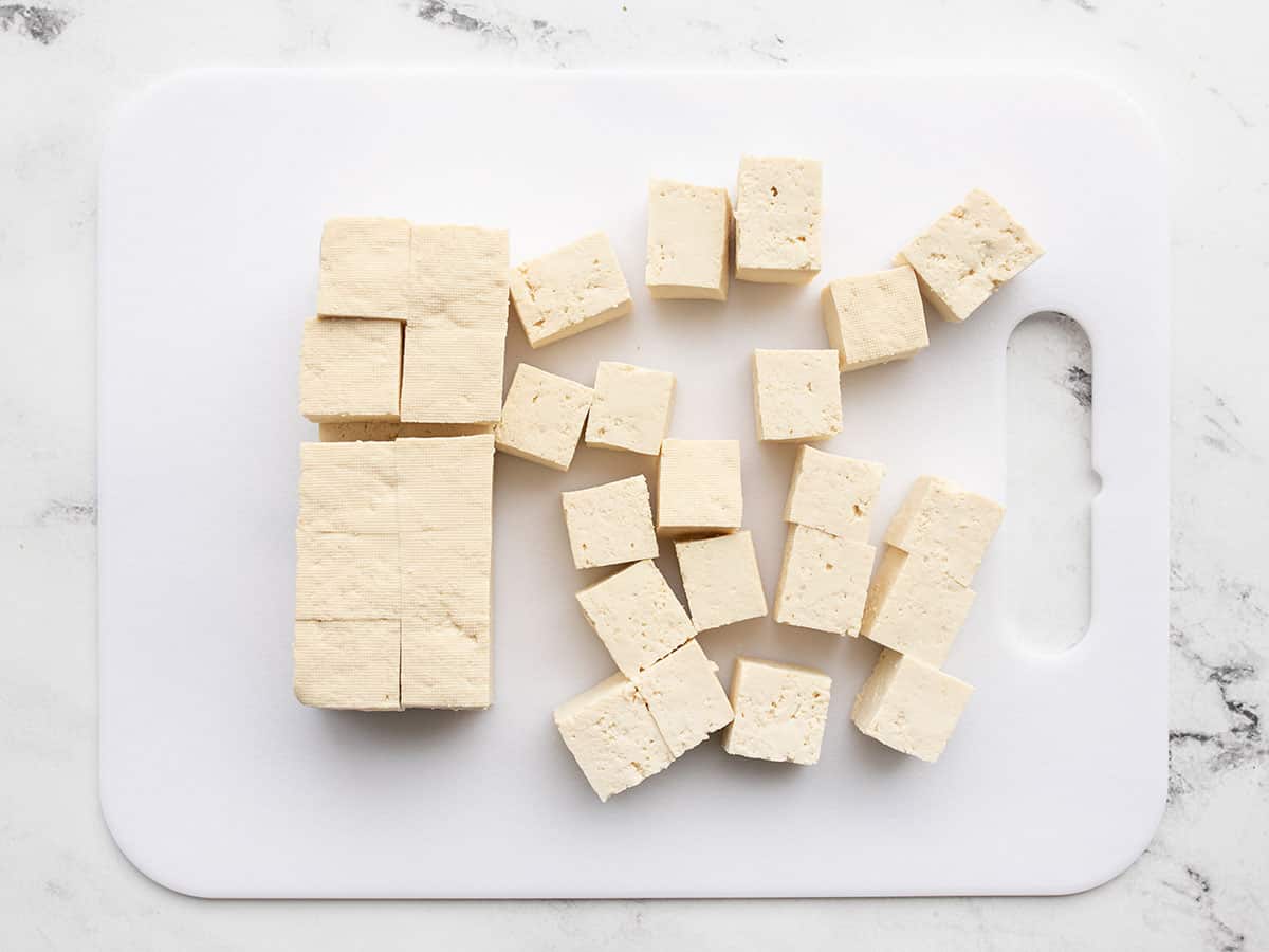 Cubed tofu on a cutting board