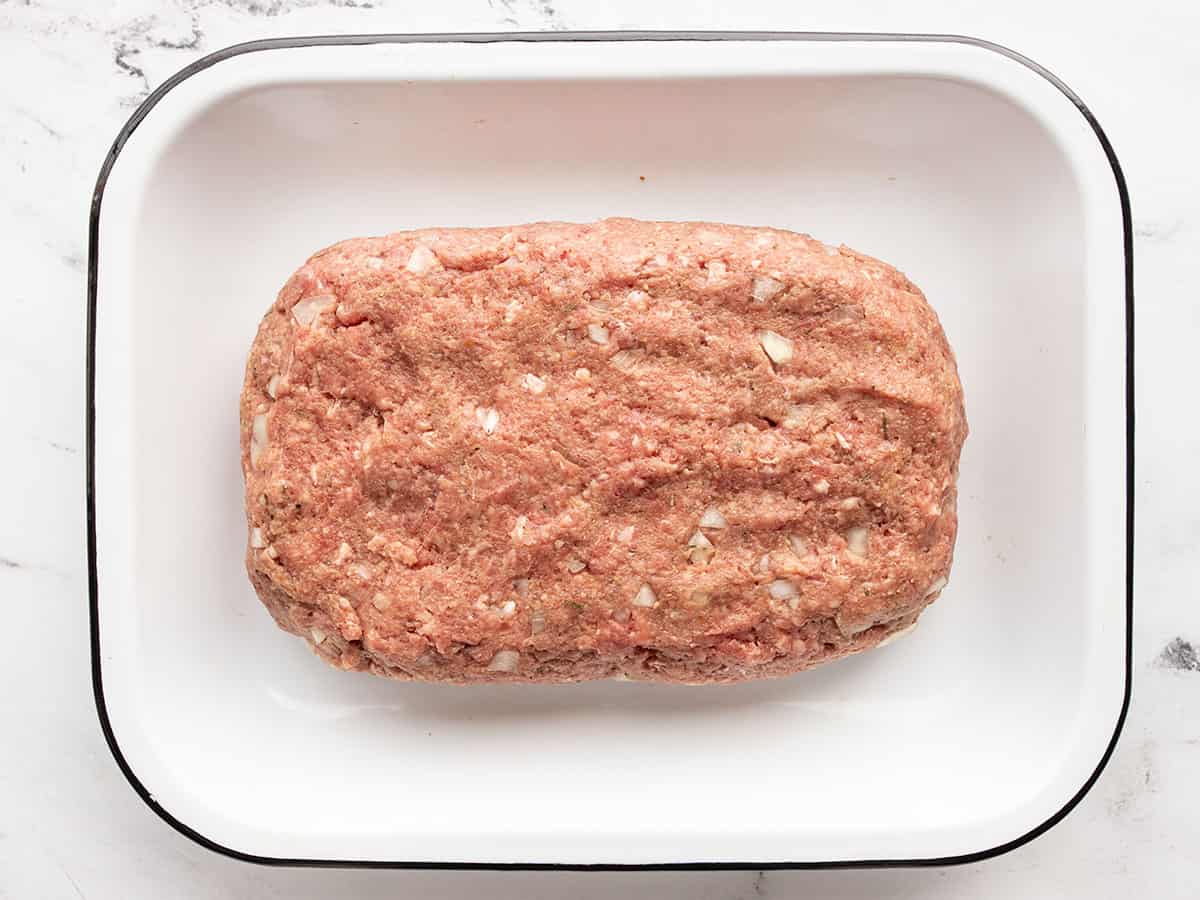 shaped meatloaf in baking dish