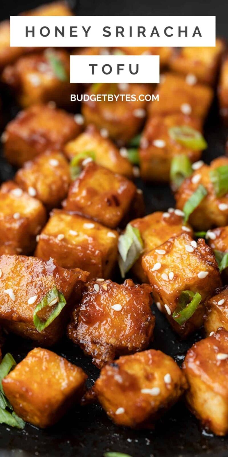 close up of honey sriracha tofu with title text at the top
