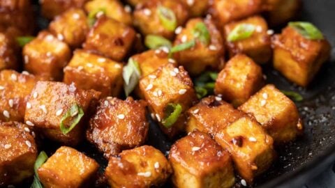 Close up of honey sriracha tofu in the skillet