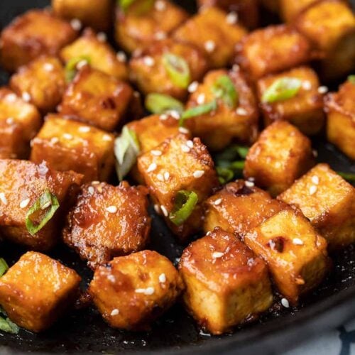 Close up of honey sriracha tofu in the skillet