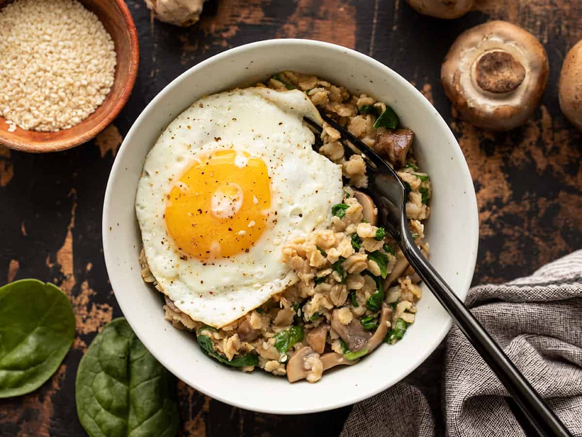 A bowl of Savory Oatmeal with an egg on top