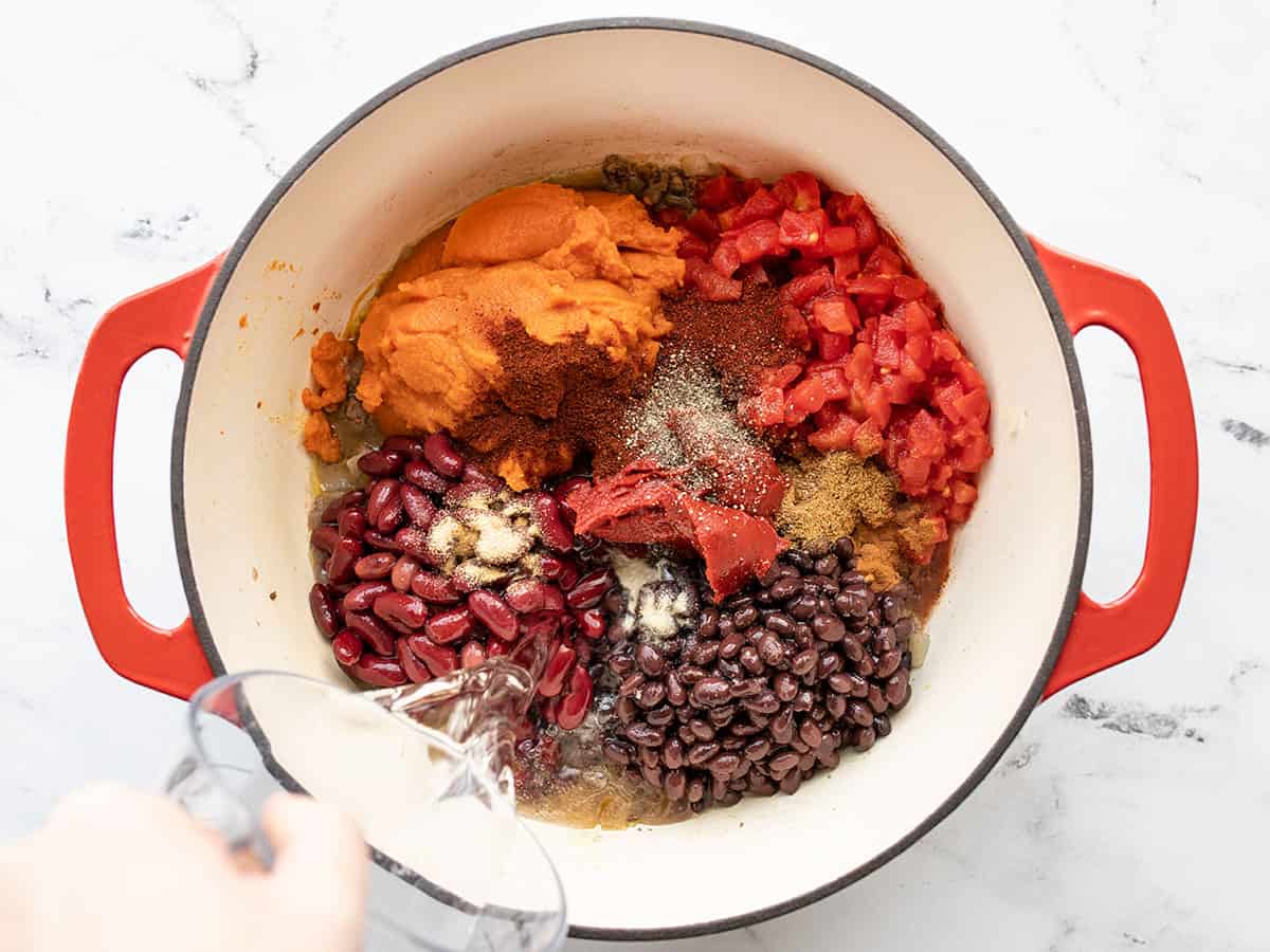 remaining chili ingredients added to the pot, unstirred.